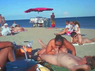 Milf Blows Her young woman On Nude Beach By Voyeurs